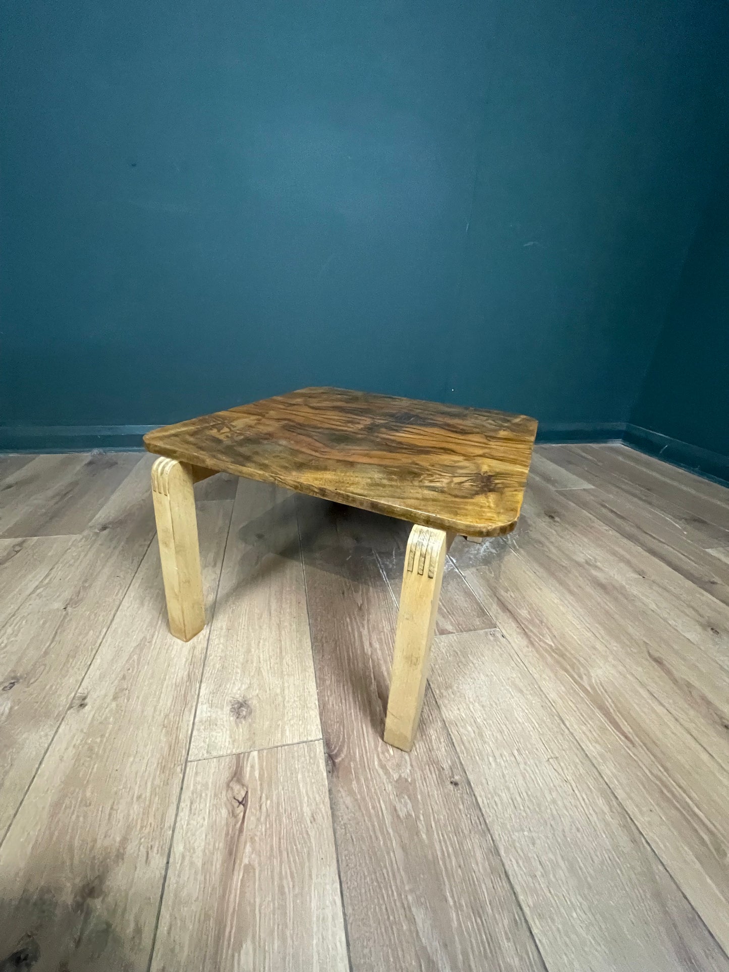 Walnut veneer coffee table with birch wood legs by Alvar Alto