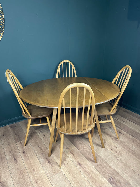 Ercol blonde round drop leaf table and 4 Windsor chairs