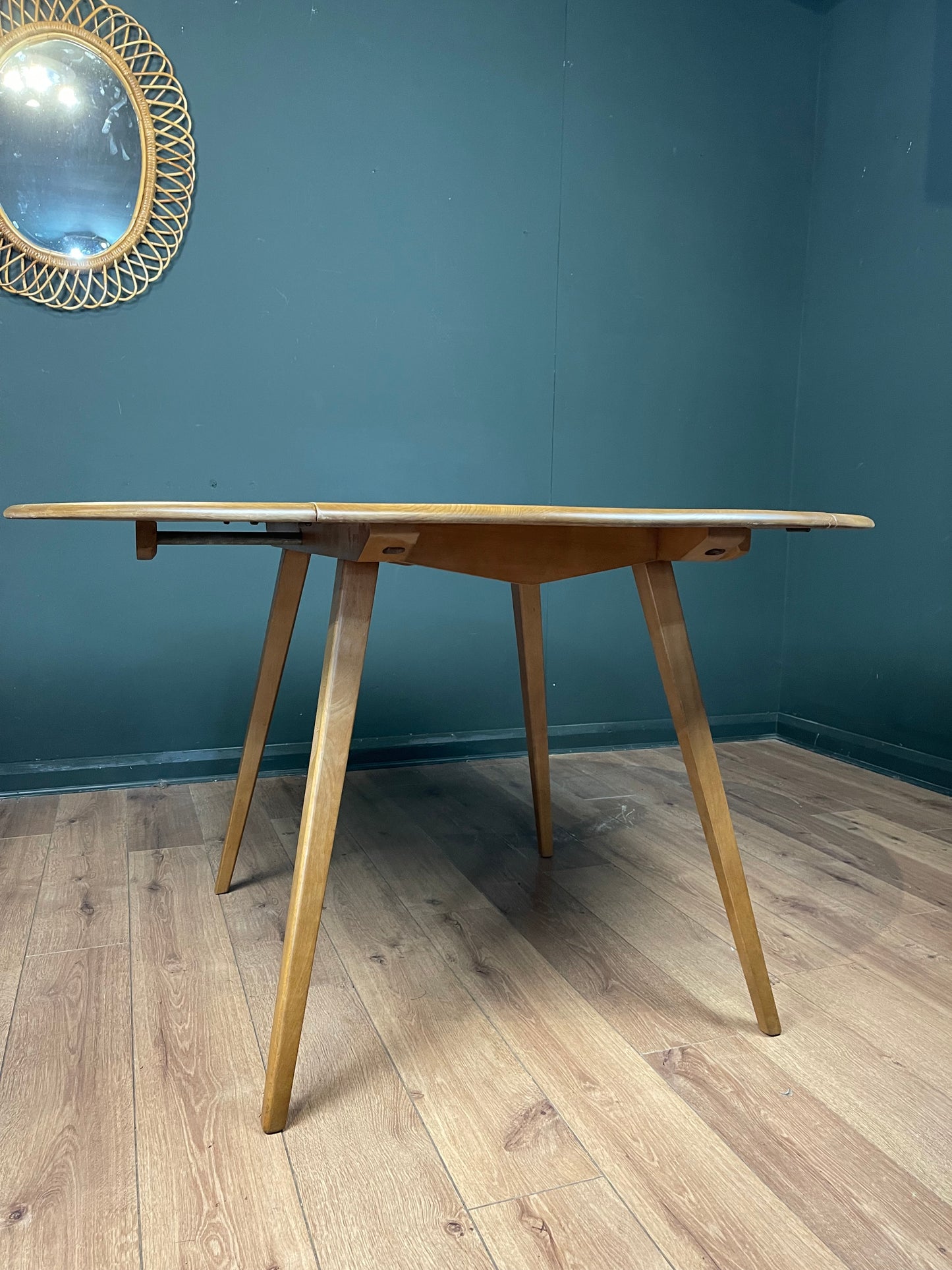 Ercol blonde round drop leaf table and 4 Windsor chairs