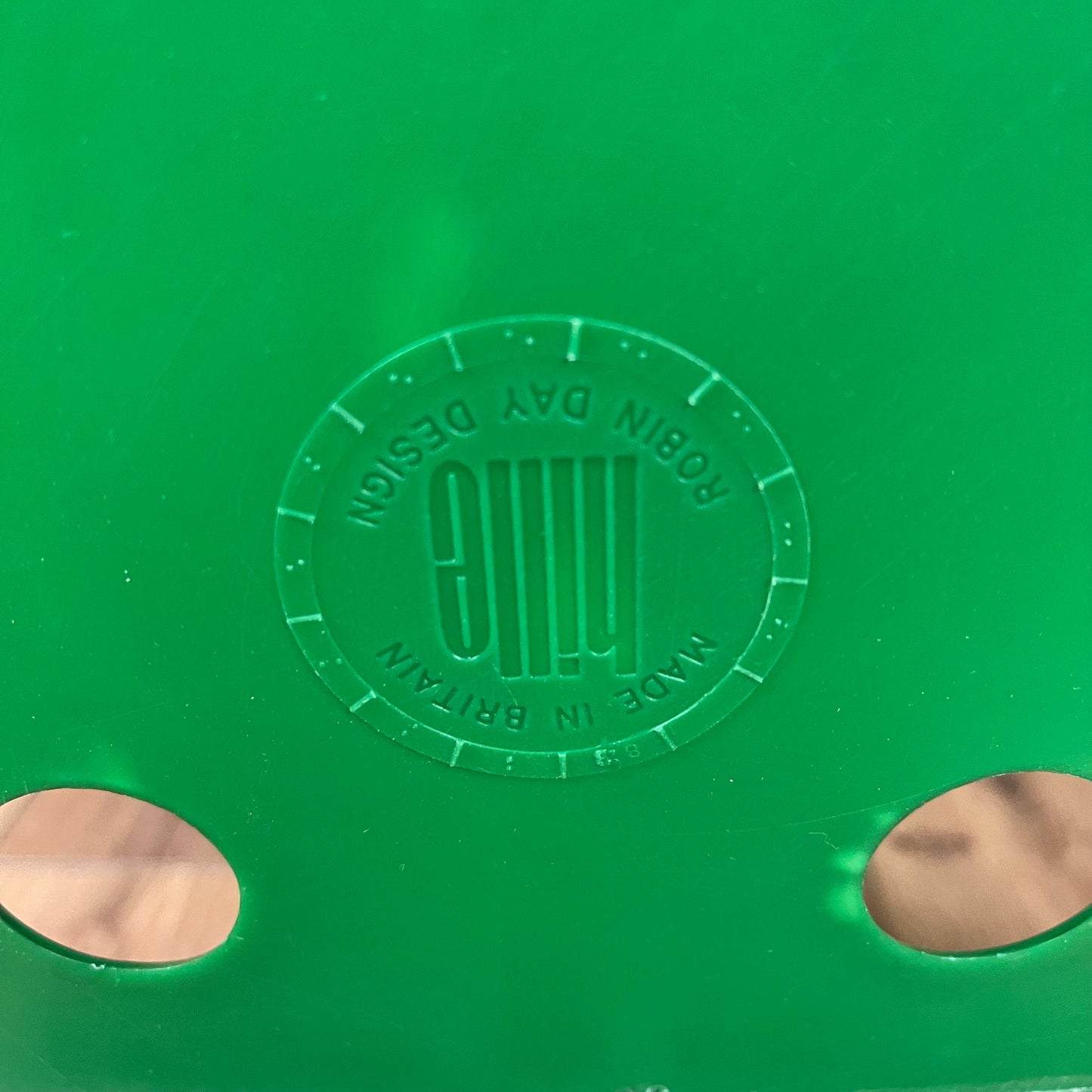 Green vintage Robin Day Polo chair with chrome legs