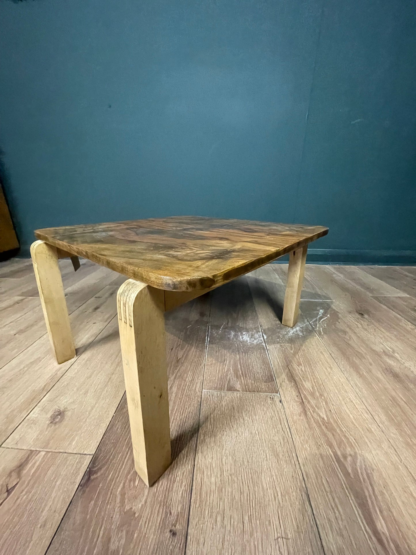 Walnut veneer coffee table with birch wood legs by Alvar Alto