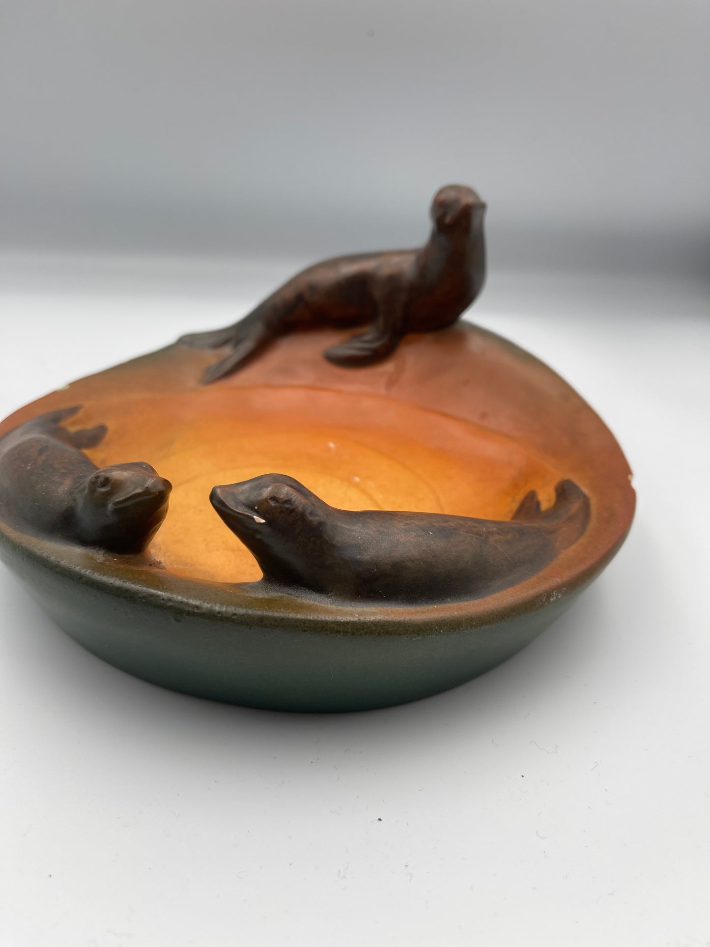 Danish Art Nouveau sealion bowl hand painted by Ipsen's Widow.