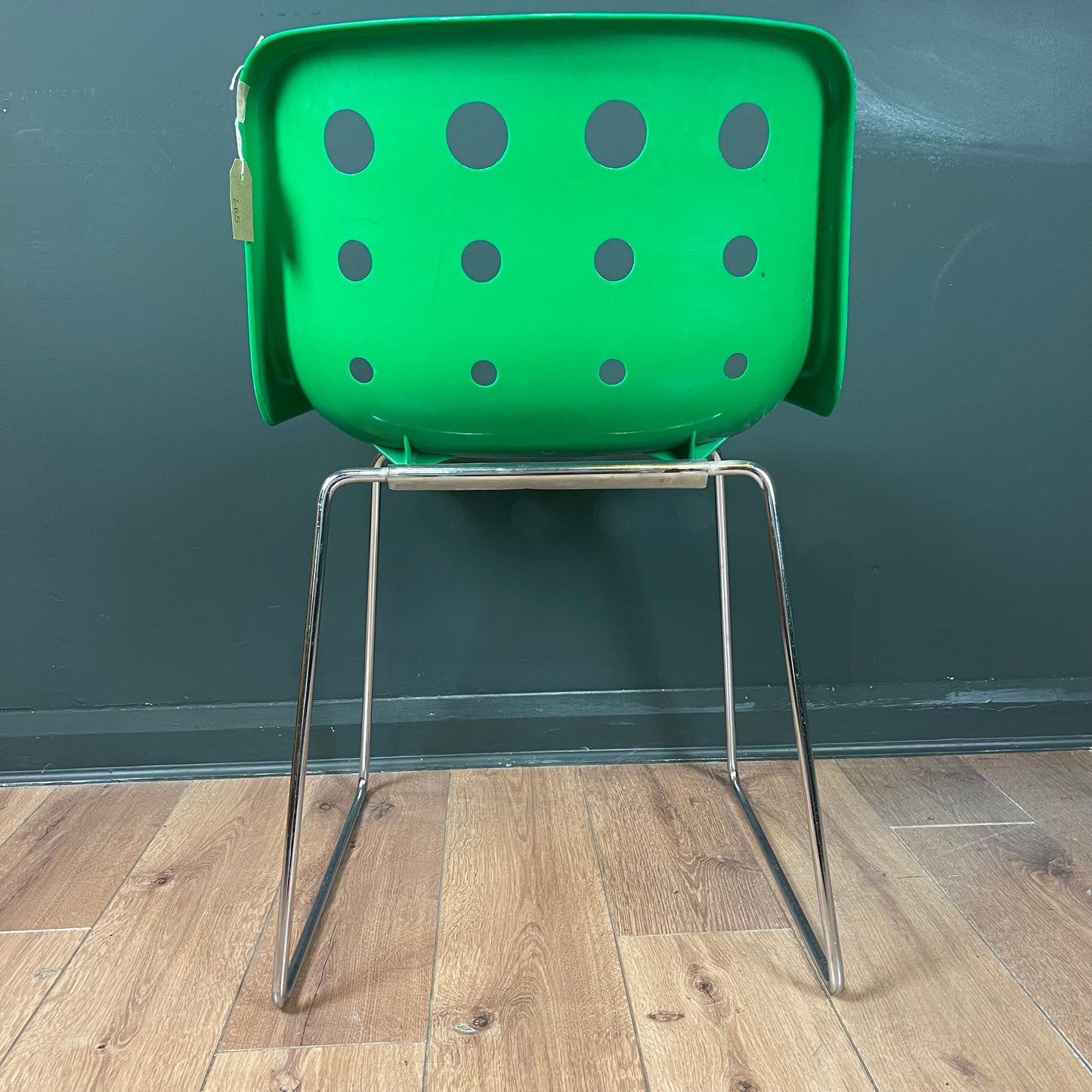 Green vintage Robin Day Polo chair with chrome legs