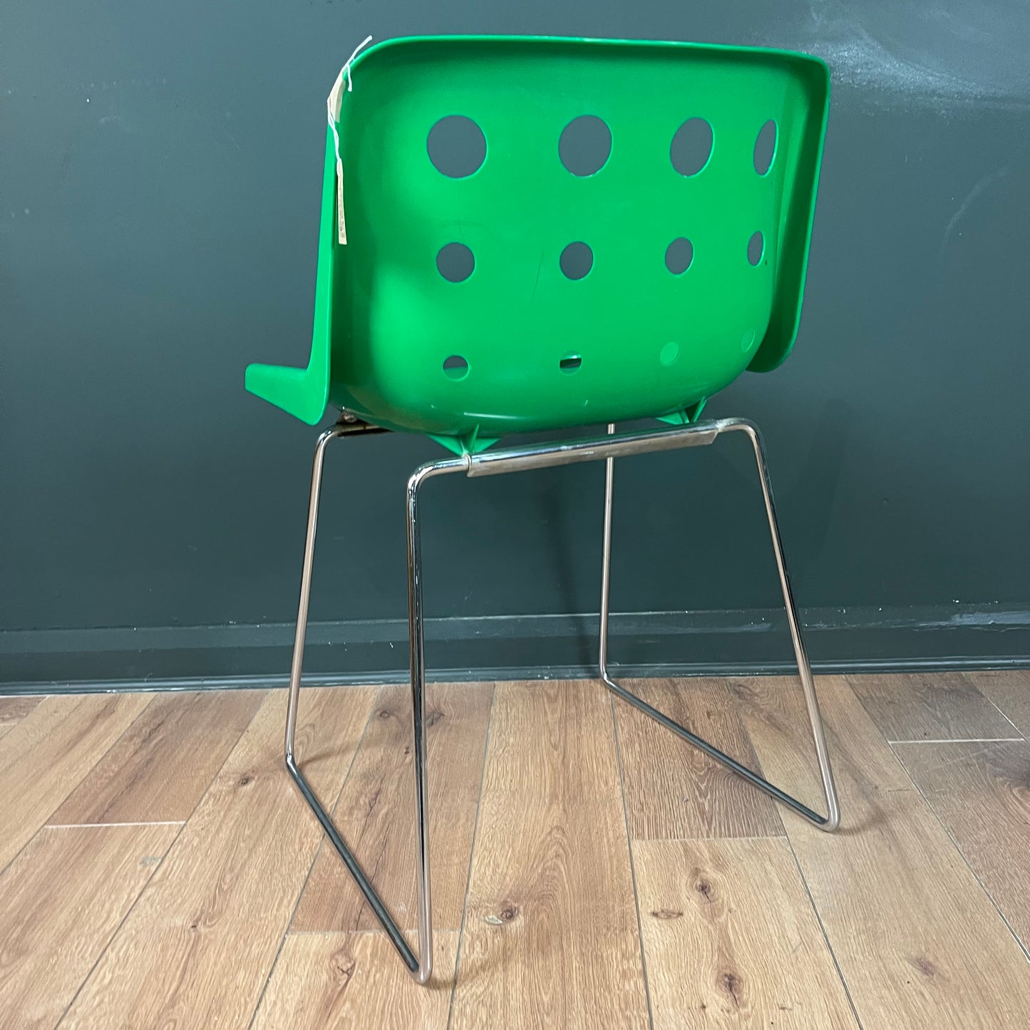 Green vintage Robin Day Polo chair with chrome legs