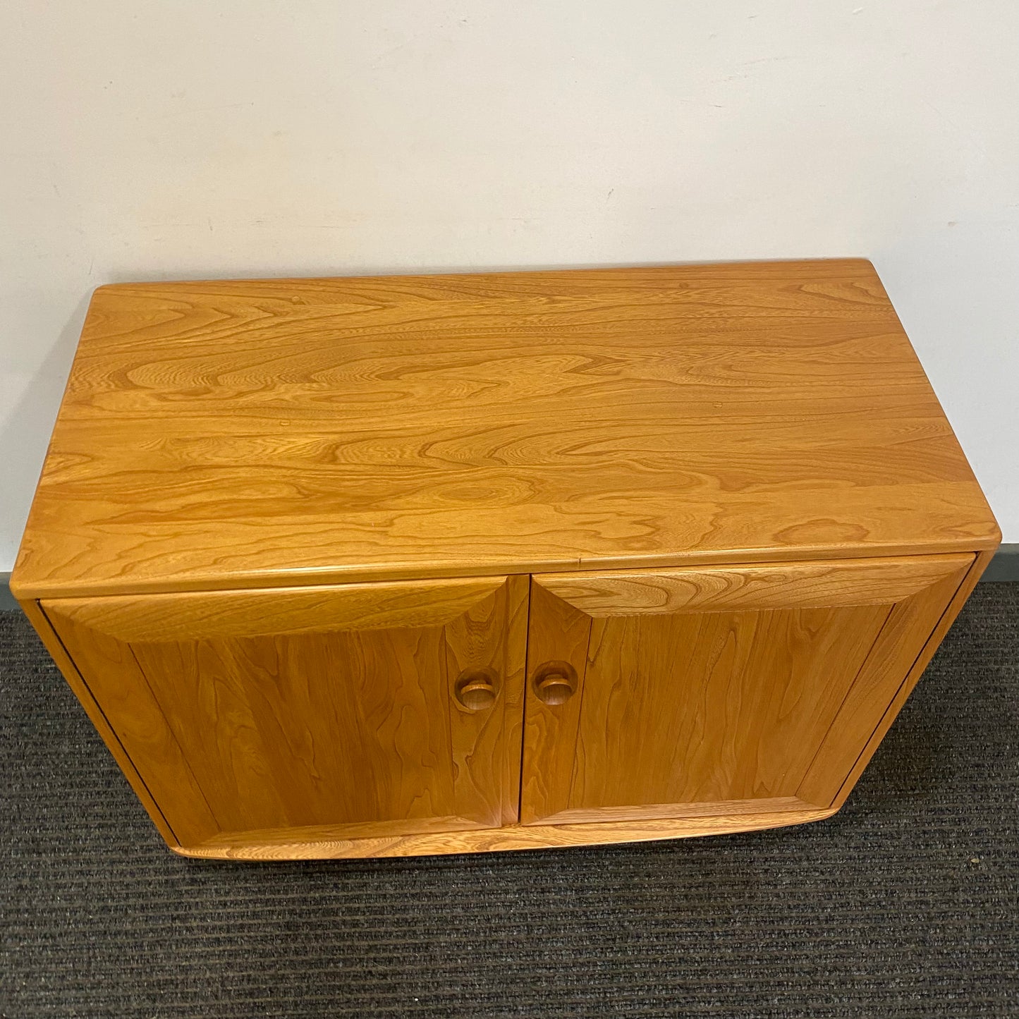 Ercol 2 door cabinet #1013 solid elm. Excellent condition.
