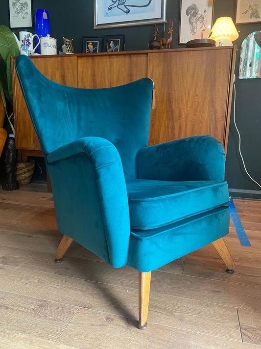 Teal velvet Midcentury wingback armchair by Howard Keith